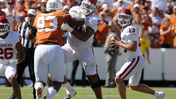 Oklahoma's Caleb Williams (13) drops back to pass during the Red River Showdown college football game between the University of Oklahoma Sooners (OU) and the University of Texas (UT) Longhorns at the Cotton Bowl in Dallas, Saturday, Oct. 9, 2021. Oklahoma won 55-48.
Ou Vs Texas
Syndication The Oklahoman Oklahoma's Caleb Williams (13) drops back to pass during the Red River Showdown college football game between the University of Oklahoma Sooners (OU) and the University of Texas (UT) Longhorns at the Cotton Bowl in Dallas, Saturday, Oct. 9, 2021. Oklahoma won 55-48.
Ou Vs Texas
Syndication The Oklahoman