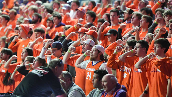 Jan 6, 2024; Clemson, South Carolina, USA; Clemson fans cheer during the first half in the game against North Carolina at Littlejohn Coliseum. Mandatory Credit: Ken Ruinard-Imagn Images