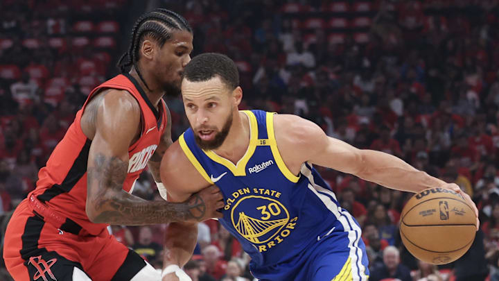 Apr 30, 2025; Houston, Texas, USA; Golden State Warriors guard Stephen Curry (30) dribbles against Houston Rockets guard Jalen Green (4) in the first quarter during game five of first round for the 2025 NBA Playoffs at Toyota Center. Mandatory Credit: Thomas Shea-Imagn Images