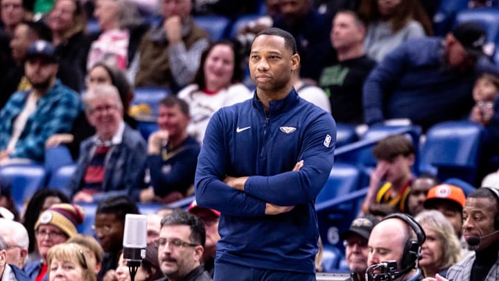 Dec 5, 2024; New Orleans, Louisiana, USA;  New Orleans Pelicans head coach Willie Green stands on the court against the Phoenix Suns during the first half  at Smoothie King Center. Mandatory Credit: Stephen Lew-Imagn Images