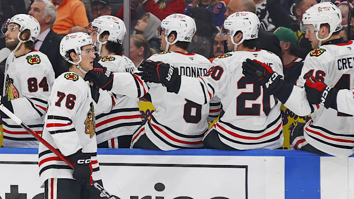 Apr 2, 2026; Edmonton, Alberta, CAN; The Chicago Blackhawks celebrate a goal scored  forward Nick Lardis (76) during the third period against the Edmonton Oilers at Rogers Place. Mandatory Credit: Perry Nelson-Imagn Images
