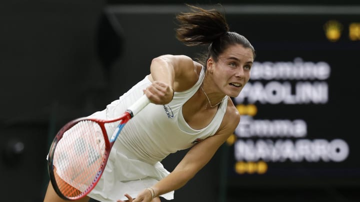 Jul 9, 2024; London, United Kingdom; Emma Navarro (USA) serves against Jasmine Paolini (ITA) (not pictured) in a ladies' singles quarter final match on day nine of The Championships Wimbledon 2024 at The All England Lawn Tennis Club. Jul 9, 2024; London, United Kingdom; Emma Navarro (USA) serves against Jasmine Paolini (ITA) (not pictured) in a ladies' singles quarter final match on day nine of The Championships Wimbledon 2024 at The All England Lawn Tennis Club.