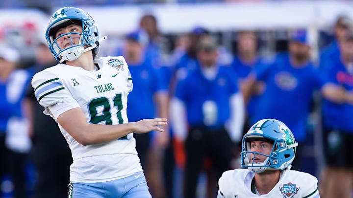 Tulane Green Wave place kicker Patrick Durkin (91) reacts to missing a field goal during the first half at Raymond James Stadium in Tampa, FL on Friday, December 20, 2024 in the 2024 Union Home Mortgage Gasparilla Bowl. Tulane Green Wave place kicker Patrick Durkin (91) reacts to missing a field goal during the first half at Raymond James Stadium in Tampa, FL on Friday, December 20, 2024 in the 2024 Union Home Mortgage Gasparilla Bowl.