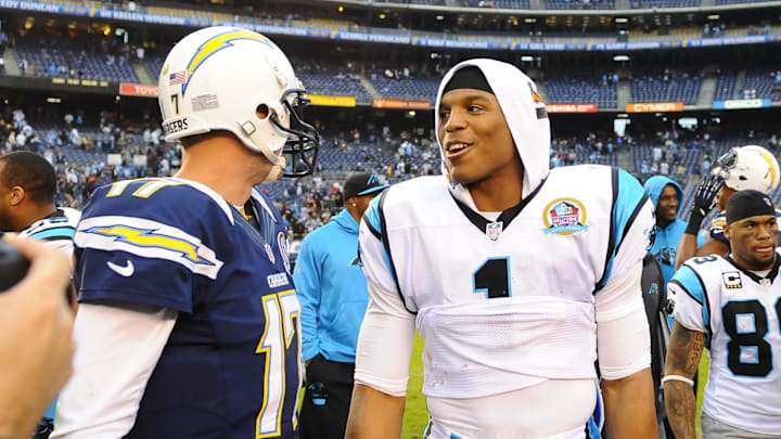 December 16, 2012; San Diego, CA, USA; Carolina Panthers quarterback Cam Newton (1) talks with San Diego Chargers quarterback Philip Rivers (17) after a 31-7 win by the Panthers at Qualcomm Stadium. The Panthers won 31-7. Mandatory Credit: Christopher Hanewinckel-Imagn Images