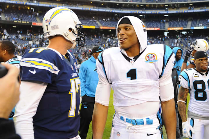 December 16, 2012; San Diego, CA, USA; Carolina Panthers quarterback Cam Newton (1) talks with San Diego Chargers quarterback December 16, 2012; San Diego, CA, USA; Carolina Panthers quarterback Cam Newton (1) talks with San Diego Chargers quarterback