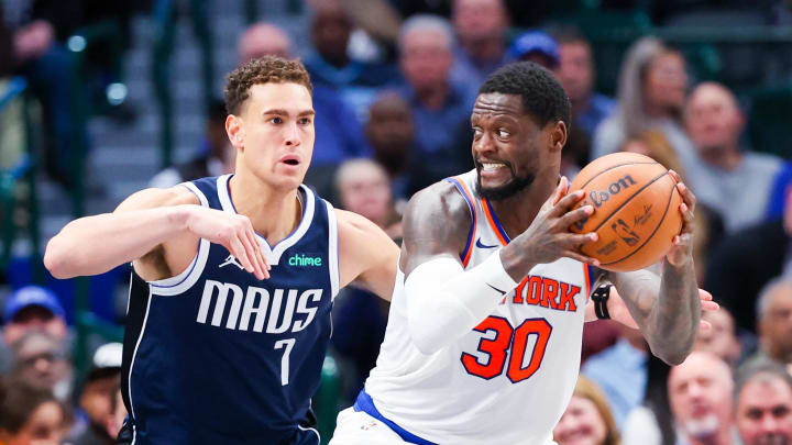 Jan 11, 2024; Dallas, Texas, USA;  New York Knicks forward Julius Randle (30) looks to score as Dallas Mavericks center Dwight Powell (7) defends during the second half at American Airlines Center. Mandatory Credit: Kevin Jairaj-USA TODAY Sports