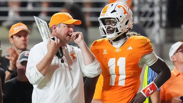 Sep 19, 2026; Knoxville, Tennessee, USA;  Tennessee coach Josh Heupel chats with Tennessee quarterback Faizon Brandon (11) during Tennesseea?TMs college football game against Kennesaw State at Neyland Stadium in Knoxville on Sept. 19, 2026.  Mandatory Credit: Saul Young/News Sentinel-USA TODAY NETWORK via Imagn Images