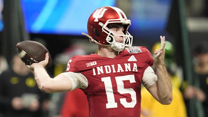 Indiana Hoosiers quarterback Fernando Mendoza (15) throws a pass against the Oregon Ducks during the third quarter of the 2025 Peach Bowl and semifinal game of the College Football Playoff at Mercedes-Benz Stadium. Mandatory Credit: Dale Zanine-Imagn Images