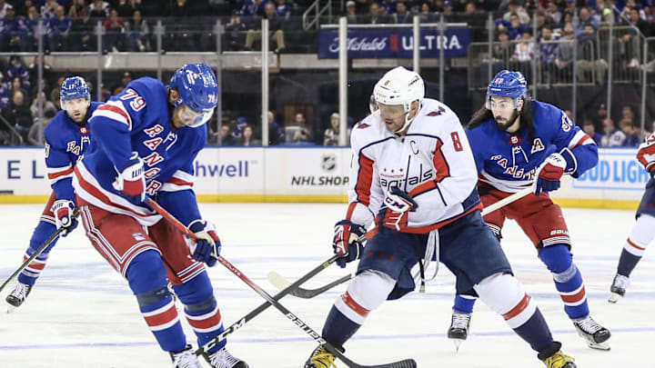 Dec 27, 2023; New York, New York, USA; New York Rangers defenseman K'Andre Miller (79) and