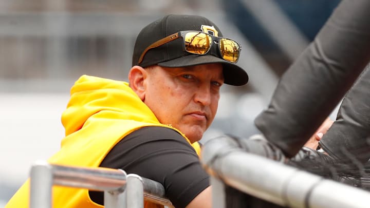 Jun 7, 2024; Pittsburgh, Pennsylvania, USA;  Pittsburgh Pirates hitting coach Andy Haines (49) looks on at the batting cage before the game against he Minnesota Twins at PNC Park. Mandatory Credit: Charles LeClaire-Imagn Images