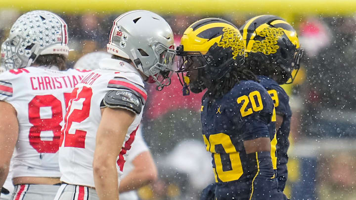 Ohio State Buckeyes wide receiver David Adolph (82) head butts with Michigan Wolverines defensive back Jyaire Hill (20) during the NCAA football game at Michigan Stadium in Ann Arbor, Mich. on Nov. 29, 2025. Ohio State won 27-9. Ohio State Buckeyes wide receiver David Adolph (82) head butts with Michigan Wolverines defensive back Jyaire Hill (20) during the NCAA football game at Michigan Stadium in Ann Arbor, Mich. on Nov. 29, 2025. Ohio State won 27-9.