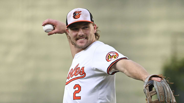 Baltimore Orioles shortstop Gunnar Henderson (2) smile while warming up before the game against the Chicago White Sox at Oriole Park at Camden Yards on Sept. 4.