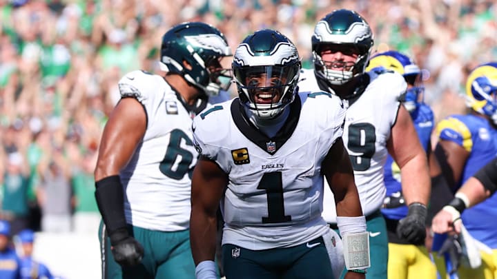 Sep 21, 2025; Philadelphia, Pennsylvania, USA; Philadelphia Eagles quarterback Jalen Hurts (1) reacts after a touchdown pass to wide receiver Devonta Smith (not pictured) during the fourth quarter against the Los Angeles Rams at Lincoln Financial Field. Mandatory Credit: Bill Streicher-Imagn Images Sep 21, 2025; Philadelphia, Pennsylvania, USA; Philadelphia Eagles quarterback Jalen Hurts (1) reacts after a touchdown pass to wide receiver Devonta Smith (not pictured) during the fourth quarter against the Los Angeles Rams at Lincoln Financial Field. Mandatory Credit: Bill Streicher-Imagn Images