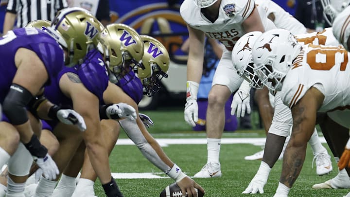 Jan 1, 2024; New Orleans, LA, USA; The Washington Huskies offense lines up against the Texas Longhorns defense in the 2024 Sugar Bowl college football playoff semifinal game at Caesars Superdome. Mandatory Credit: Geoff Burke-Imagn Images