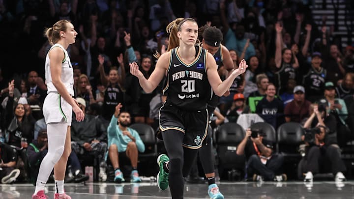 Oct 13, 2024; Brooklyn, New York, USA; New York Liberty guard Sabrina Ionescu (20) reacts after scoring in the first quarter against the Minnesota Lynx during game two of the 2024 WNBA Finals at Barclays Center. Mandatory Credit: Wendell Cruz-Imagn Images Oct 13, 2024; Brooklyn, New York, USA; New York Liberty guard Sabrina Ionescu (20) reacts after scoring in the first quarter against the Minnesota Lynx during game two of the 2024 WNBA Finals at Barclays Center. Mandatory Credit: Wendell Cruz-Imagn Images