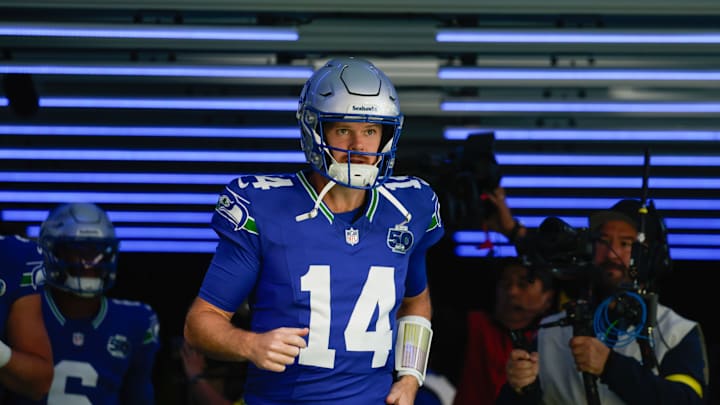 Oct 5, 2025; Seattle, Washington, USA; Seattle Seahawks quarterback Sam Darnold (14) takes the field prior to a game against the Tampa Bay Buccaneers at Lumen Field. 