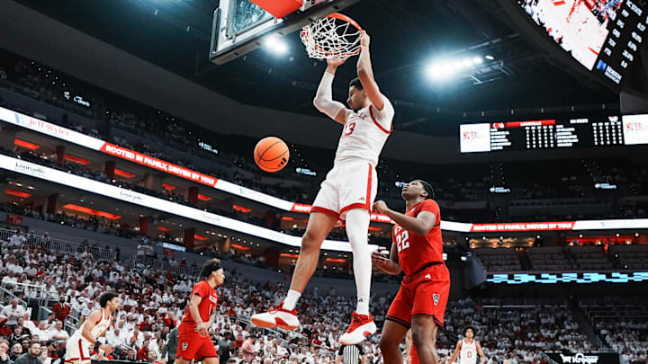 Louisville Cardinals forward Sananda Fru (13) slams down two points against NC State during ACC basketball February 9, 2026 in Louisville, Kentucky.