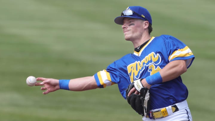 RubberDucks second baseman Travis Bazzana throws to first base to retire an Altoona Curve runner on April 13, 2025, in Akron, Ohio.