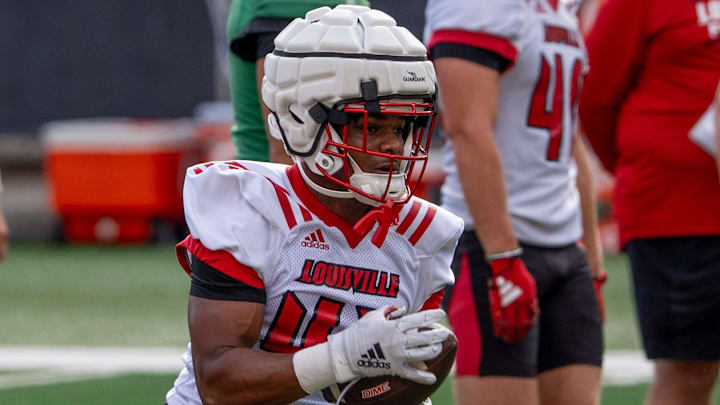University of Louisville running back Shammai Gates (43) runs a drill during their second practice on Friday, Aug. 2, 2024 at L&N Federal Credit Union Stadium.