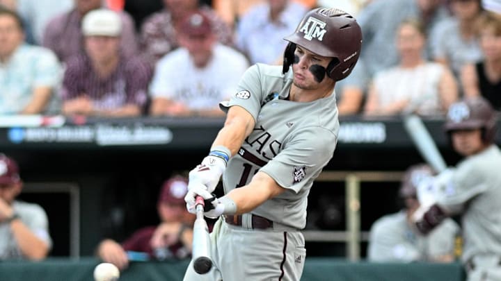 Texas A&M Aggies left fielder Caden Sorrell (13) singles in a run against the Tennessee Volunteers.