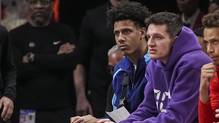 Feb 24, 2025; Atlanta, Georgia, USA; Atlanta Hawks injured players forward Jalen Johnson (1) and guard Vit Krejci (27) sit on the bench during the game against the Miami Heat at State Farm Arena. Mandatory Credit: Dale Zanine-Imagn Images