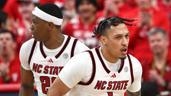 Feb 17, 2026; Raleigh, North Carolina, USA;  NC State Wolfpack forward Darrion Williams (1) looks on after scoring against the North Carolina Tar Heels during the second half at Lenovo Center. Mandatory Credit: Zachary Taft-Imagn Images