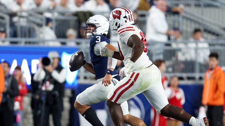 Penn State Nittany Lions quarterback Rocco Becht (3) runs with the ball against the Wisconsin Badgers at Beaver Stadium. Penn State Nittany Lions quarterback Rocco Becht (3) runs with the ball against the Wisconsin Badgers at Beaver Stadium.