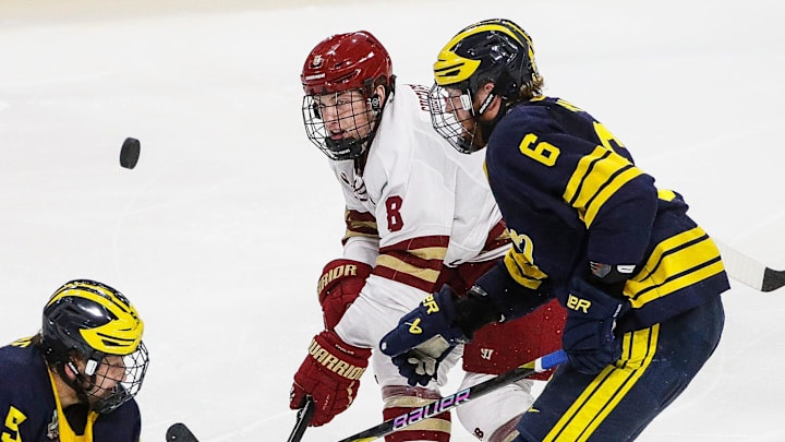 Boston College defenseman Lukas Gustafsson (8) and Michigan forward Josh Eernisse (6) battle for the puck during the second period of the Frozen Four semifinal game at Xcel Energy Center in St. Paul, Minn. on Thursday, April 11, 2024. Boston College defenseman Lukas Gustafsson (8) and Michigan forward Josh Eernisse (6) battle for the puck during the second period of the Frozen Four semifinal game at Xcel Energy Center in St. Paul, Minn. on Thursday, April 11, 2024.