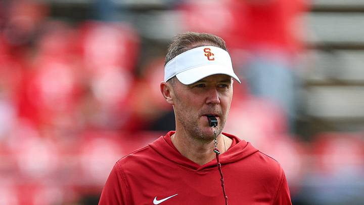 Sep 19, 2026; Piscataway, New Jersey, USA; USC Trojans head coach Lincoln Riley on the field during warm ups before the game against the Rutgers Scarlet Knights at SHI Stadium. Mandatory Credit: Vincent Carchietta-Imagn Images Sep 19, 2026; Piscataway, New Jersey, USA; USC Trojans head coach Lincoln Riley on the field during warm ups before the game against the Rutgers Scarlet Knights at SHI Stadium. Mandatory Credit: Vincent Carchietta-Imagn Images