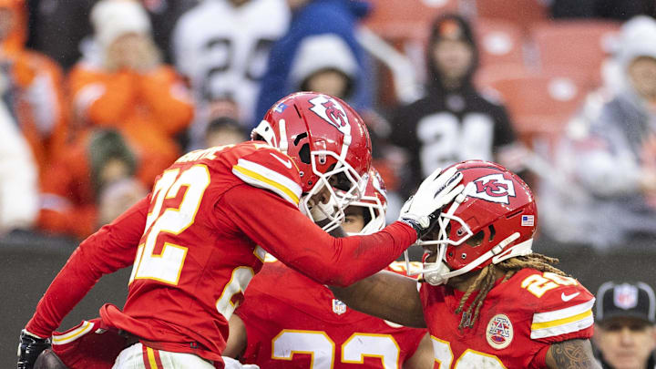Dec 15, 2024; Cleveland, Ohio, USA; Kansas City Chiefs cornerback Trent McDuffie (22) celebrates his interception with teammates against the Cleveland Browns during the fourth quarter at Huntington Bank Field. Mandatory Credit: Scott Galvin-Imagn Images