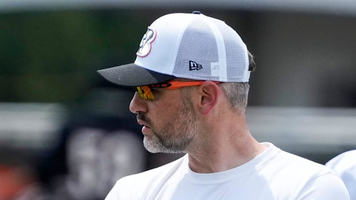 Dan Pitcher watches quarterback drills during a preseason training camp practice at the Paycor Stadium practice field in downtown Cincinnati on Wednesday, Aug. 7, 2024.