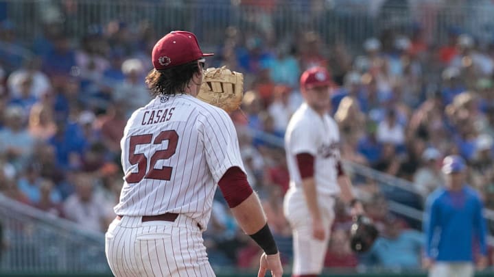Gamecocks infielder Gavin Casas (52) with the catch at first for the out against Florida in Game 2