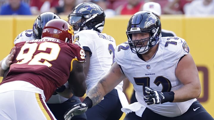 Aug 28, 2021; Landover, Maryland, USA; Baltimore Ravens guard Ben Powers (72) blocks against the