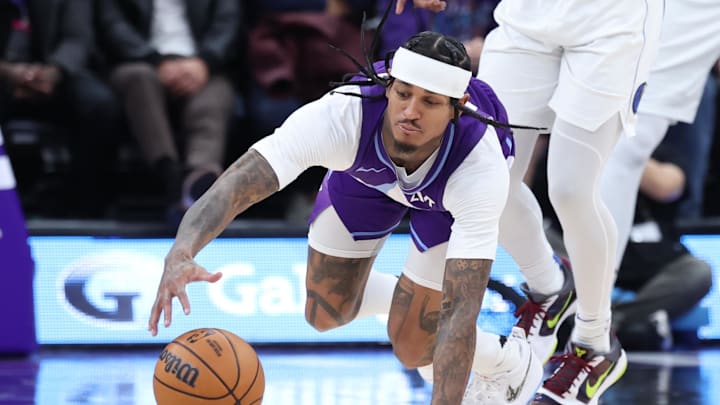 Utah Jazz guard Jordan Clarkson goes for a loose ball against the Dallas Mavericks. Mandatory Credit: Rob Gray-Imagn Images