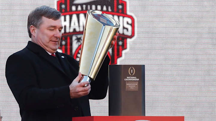 Georgia coach Kirby Smart celebrates with the National Championship trophy during Georgia's back to back National Championship celebration in Athens, Ga., on Saturday, Jan. 14, 2023.

News Joshua L Jones