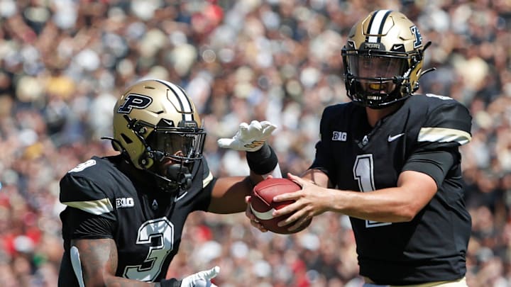 Purdue Boilermakers running back Tyrone Tracy Jr. (3) receives a hand-off from Purdue Boilermakers