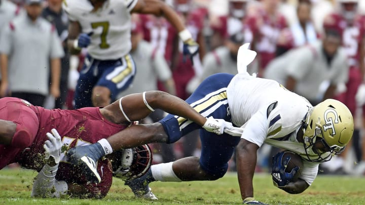 Oct 29, 2022; Tallahassee, Florida, USA; Georgia Tech Yellow Jackets running back Hassan Hall (3) is tackled by Florida State Seminoles defensive end Jared Verse (5) during the second half at Doak S. Campbell Stadium. Mandatory Credit: Melina Myers-USA TODAY Sports Oct 29, 2022; Tallahassee, Florida, USA; Georgia Tech Yellow Jackets running back Hassan Hall (3) is tackled by Florida State Seminoles defensive end Jared Verse (5) during the second half at Doak S. Campbell Stadium. Mandatory Credit: Melina Myers-USA TODAY Sports