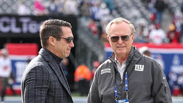 Nov 24, 2024; East Rutherford, New Jersey, USA; New York Giants owner John Mara, left, and New York Giants general manager Joe Schoen on the field before the game between the Giants and the Tampa Bay Buccaneers at MetLife Stadium.  