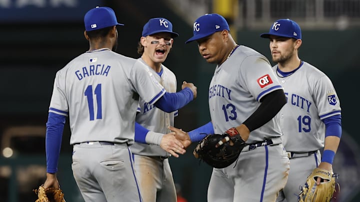 Sep 24, 2024; Washington, District of Columbia, USA; Kansas City Royals third base Maikel Garcia (11), Royals shortstop Bobby Witt Jr. (7), Royals first baseman Salvador Perez (13), and Kansas City Royals second base Michael Massey (19) celebrate after their game against the Washington Nationals at Nationals Park. Mandatory Credit: Geoff Burke-Imagn Images