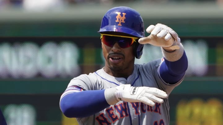 Jun 21, 2024; Chicago, Illinois, USA; New York Mets shortstop Francisco Lindor (12) gestures after hitting a double against the Chicago Cubs during the fourth inning at Wrigley Field. Mandatory Credit: David Banks-USA TODAY Sports