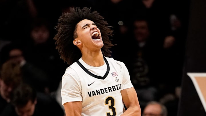 Vanderbilt guard Tyler Tanner (3) celebrates a dunk against Kentucky during the first half at Memorial Gymnasium in Nashville, Tenn., Tuesday, Jan. 27, 2026.