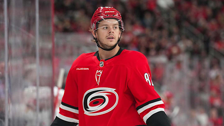 Jan 22, 2026; Raleigh, North Carolina, USA;  Carolina Hurricanes center Jesperi Kotkaniemi (82) looks on against the Carolina Hurricanes during the third period at Lenovo Center. Mandatory Credit: James Guillory-Imagn Images
