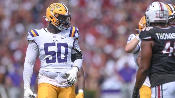 Sep 14, 2024; Columbia, South Carolina, USA; LSU Tigers offensive lineman Emery Jones Jr (50) looks on during the second quarter against the South Carolina Gamecocks at Williams-Brice Stadium. Mandatory Credit: Ken Ruinard/USA TODAY Network via Imagn Images Sep 14, 2024; Columbia, South Carolina, USA; LSU Tigers offensive lineman Emery Jones Jr (50) looks on during the second quarter against the South Carolina Gamecocks at Williams-Brice Stadium. Mandatory Credit: Ken Ruinard/USA TODAY Network via Imagn Images