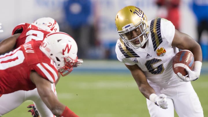 Dec 26, 2015; Santa Clara, CA, USA; UCLA Bruins wide receiver Stephen Johnson (6) runs the ball against the Nebraska Cornhuskers in the second half at Levi's Stadium. The Huskers beat the Bruins 37 to 29. at Levi's Stadium. Mandatory Credit: Neville E. Guard-Imagn Images