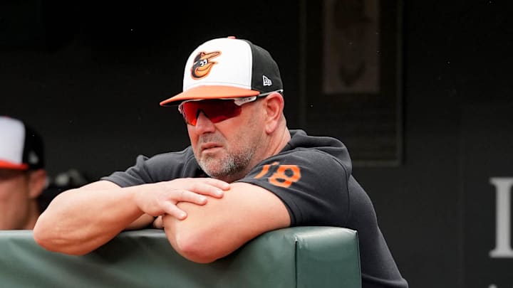 May 27, 2024; Baltimore, Maryland, USA; Baltimore Orioles manager Brandon Hyde (18) watches fourth inning action against the Boston Red Sox at Oriole Park at Camden Yards.