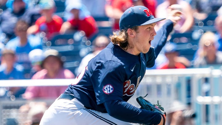 Jun 26, 2022; Omaha, NE, USA; Ole Miss Rebels starting pitcher Hunter Elliott (26) pitches against the Oklahoma Sooners during the first inning at Charles Schwab Field. Mandatory Credit: Dylan Widger-USA TODAY Sports