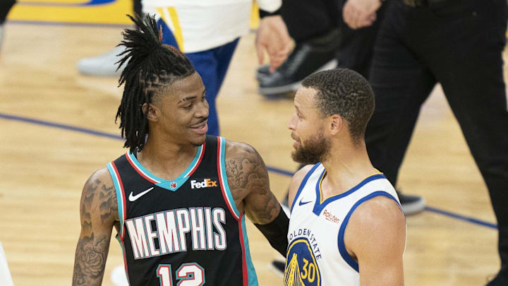 May 16, 2021; San Francisco, California, USA; Memphis Grizzlies guard Ja Morant (12) talks to Golden State Warriors guard Stephen Curry (30) after the game at Chase Center. May 16, 2021; San Francisco, California, USA; Memphis Grizzlies guard Ja Morant (12) talks to Golden State Warriors guard Stephen Curry (30) after the game at Chase Center.