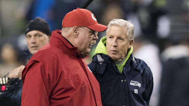 Dec 23, 2018; Seattle, WA, USA; Kansas City Chiefs head coach Andy Reid and Seattle Seahawks head coach Pete Carroll talk prior to the game at CenturyLink Field. Mandatory Credit: Steven Bisig-Imagn Images