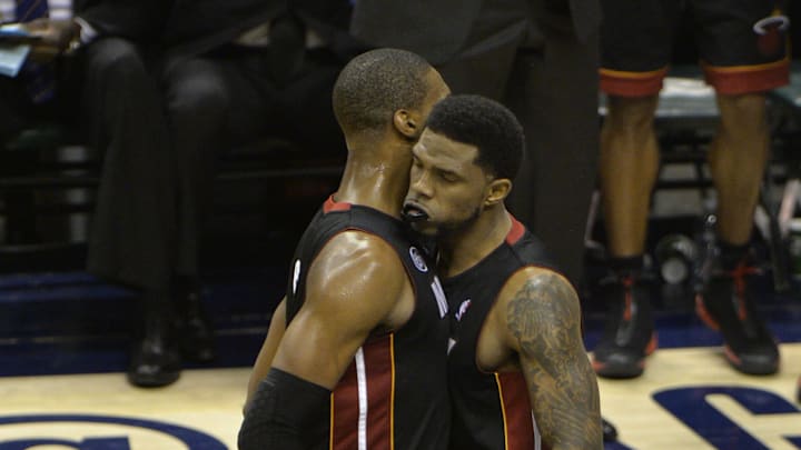 May 26, 2013; Indianapolis, IN, USA; Miami Heat center Chris Bosh (1) celebrates with power forward Udonis Haslem (40) during the second quarter against the Indiana Pacers in game three of the Eastern Conference finals of the 2013 NBA Playoffs at Bankers Life Fieldhouse. Miami defeated Indiana 114-96.  Mandatory Credit: Jamie Rhodes-Imagn Images