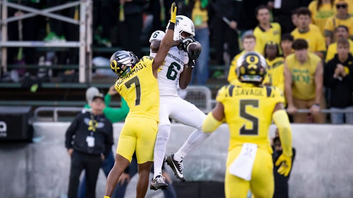 Michigan State Spartans wide receiver Nick Marsh hauls in a pass under coverage from Oregon Ducks defensive back Jabbar Muhammad as the Ducks host the Spartans Friday, Oct. 4, 2024 at Autzen Stadium in Eugene, Ore.